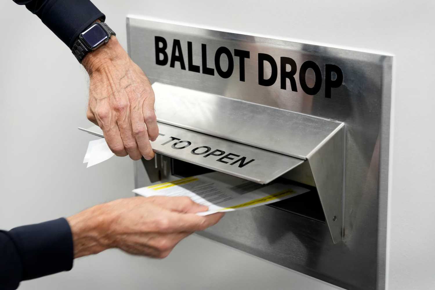 DES MOINES, IOWA - OCTOBER 14: A voter casts his ballot during early voting at the Polk County Election Office on Oct. 14, 2026, in Des Moines, Iowa.
