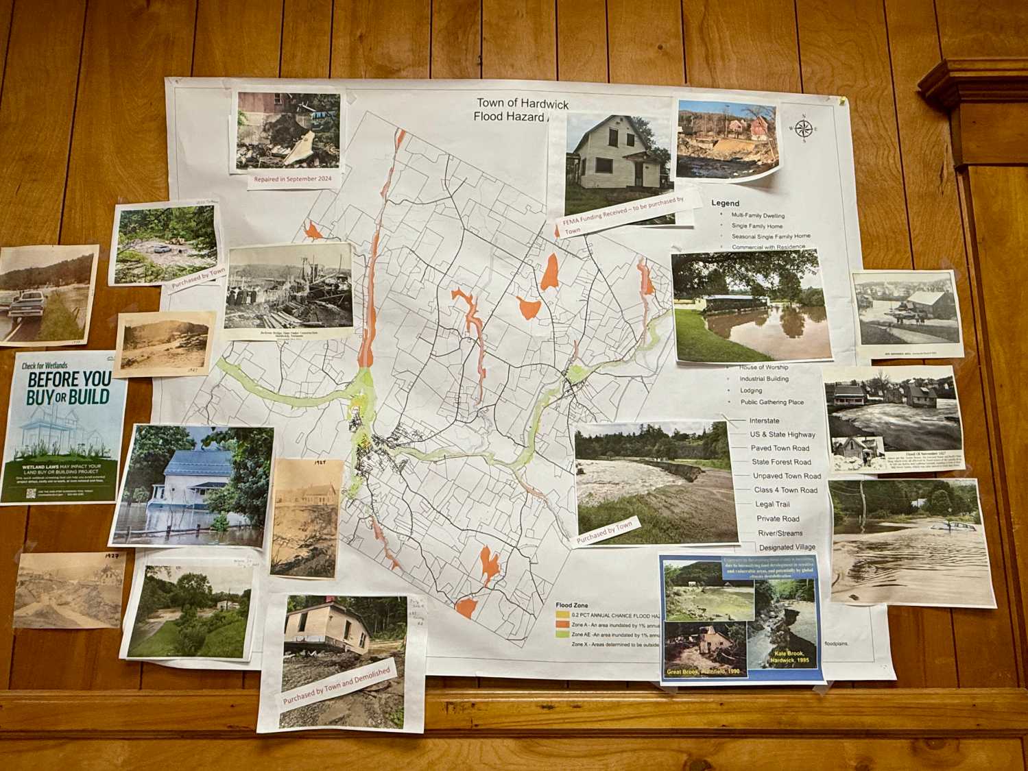 Flood images and map in Kristen Leahy's office, June 2026. (photo by Molly Born)